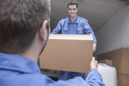 Man and a van service loading boxes for a Westminster move