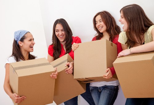 Removal team planning a Westminster house move in a central London street