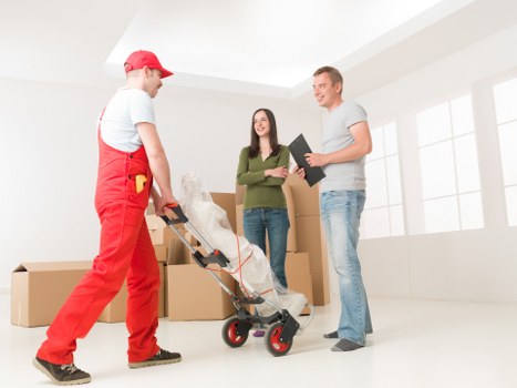Professional removal van loading furniture in Westminster