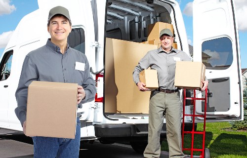 Business relocation team coordinating office removals in Westminster street setting