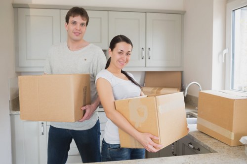 Moving furniture through a Westminster property with narrow access